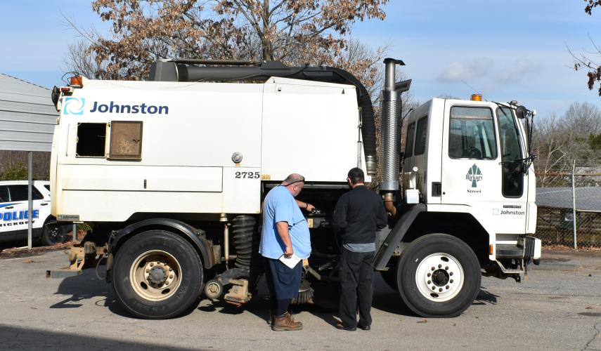 City of Hickory street sweeper operator Dan shows Bucher service manager Sean around his Johnston street sweeper