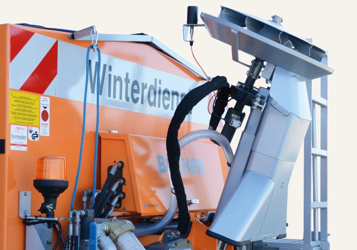 Swing-up spreader unit