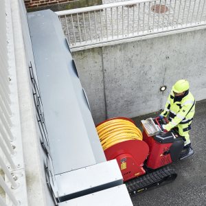 Easement reel driven into a confined area